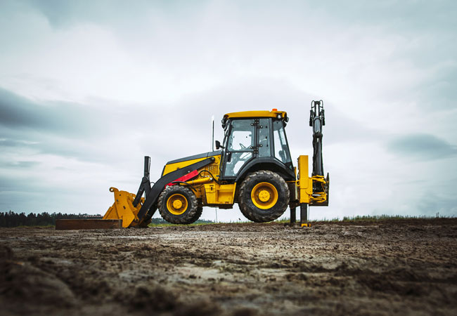 Yellow bulldozer overcome - Machine hire in Mount Isa, QLD